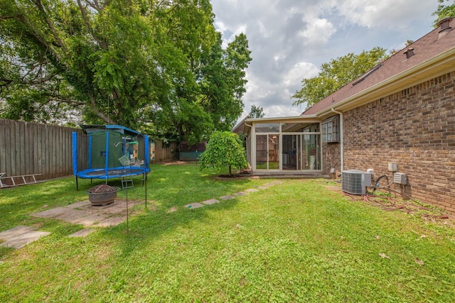 314 Millhouse Rd, Smyrna, TN 37167 - view of yard with a sunroom, a trampoline, and central AC