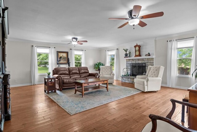 346 Spring Creek Ln, Lebanon, TN 37090 - living room with a ceiling fan, a fireplace, ornamental molding, light wood finished floors, and baseboards