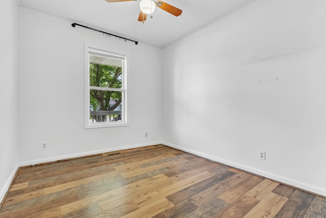 1921 Timberline Cir, Oak Grove, KY 42262 - spare room with a ceiling fan, wood finished floors, and baseboards