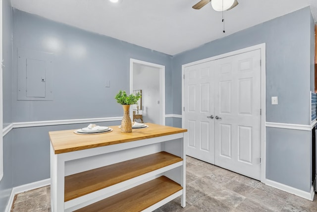 1921 Timberline Cir, Oak Grove, KY 42262 - foyer with electric panel, baseboards, a ceiling fan, and stone finish floors