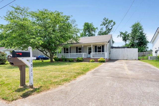 1921 Timberline Cir, Oak Grove, KY 42262 - view of front of home with a porch, concrete driveway, and roof with shingles