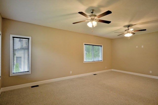 3173 Porter Hills Dr, Clarksville, TN 37043 - unfurnished room featuring healthy amount of natural light, light carpet, a ceiling fan, and baseboards
