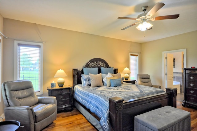 3173 Porter Hills Dr, Clarksville, TN 37043 - bedroom featuring light wood finished floors, multiple windows, and a ceiling fan