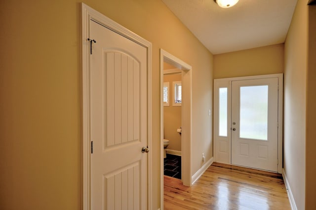 3173 Porter Hills Dr, Clarksville, TN 37043 - foyer with light wood-style flooring and baseboards