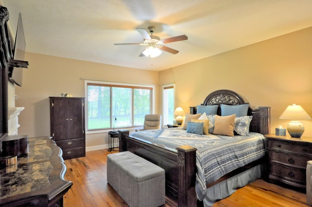 3173 Porter Hills Dr, Clarksville, TN 37043 - bedroom with wood finished floors, baseboards, and a ceiling fan