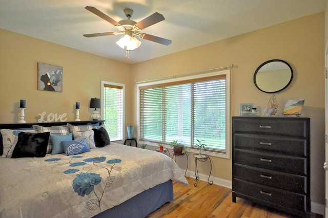 3173 Porter Hills Dr, Clarksville, TN 37043 - bedroom featuring light wood-style flooring, baseboards, and a ceiling fan