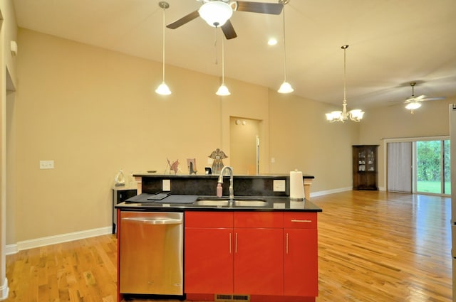 3173 Porter Hills Dr, Clarksville, TN 37043 - kitchen with red cabinetry, stainless steel dishwasher, a sink, and a ceiling fan