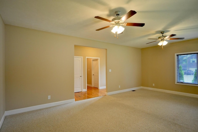 3173 Porter Hills Dr, Clarksville, TN 37043 - empty room featuring light colored carpet, a ceiling fan, and baseboards