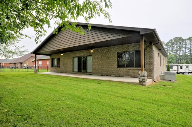 3173 Porter Hills Dr, Clarksville, TN 37043 - rear view of house featuring central air condition unit, brick siding, and a patio area