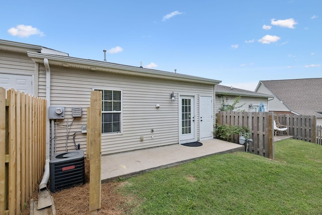 1101 Downs Blvd Unit 295, Franklin, TN 37064 - rear view of house featuring central air condition unit and a patio