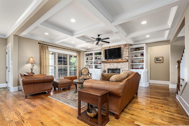 3456 Red Oak Trl, Murfreesboro, TN 37130 - living area with a large fireplace, baseboards, light wood-style flooring, ceiling fan, and coffered ceiling