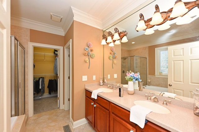 1043 Dorset Dr, Hendersonville, TN 37075 - bathroom featuring a stall shower, double vanity, tile patterned floors, a spacious closet, and a garden tub