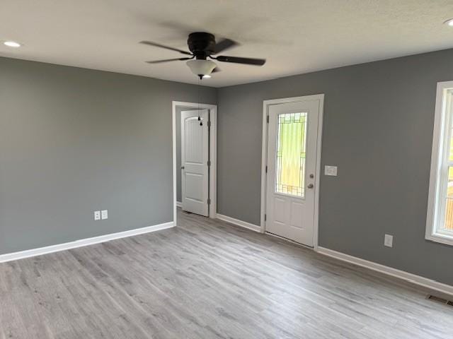 406 New Rock Creek Rd, Tullahoma, TN 37388 - empty room featuring ceiling fan, wood finished floors, baseboards, and recessed lighting