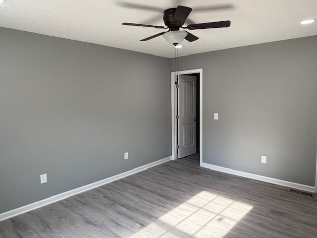406 New Rock Creek Rd, Tullahoma, TN 37388 - unfurnished room with baseboards, a ceiling fan, wood finished floors, and recessed lighting
