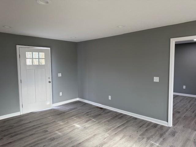 406 New Rock Creek Rd, Tullahoma, TN 37388 - entrance foyer with dark wood-style flooring and baseboards