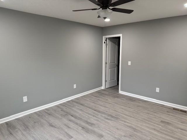406 New Rock Creek Rd, Tullahoma, TN 37388 - unfurnished room featuring ceiling fan, baseboards, and wood finished floors