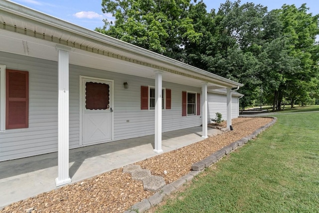 366 Huffman Park Rd, Lynchburg, TN 37352 - doorway to property with a porch and a lawn