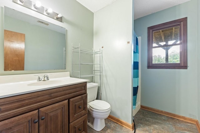 366 Huffman Park Rd, Lynchburg, TN 37352 - bathroom featuring vanity, toilet, baseboards, and a shower with curtain