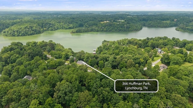 366 Huffman Park Rd, Lynchburg, TN 37352 - aerial view of property and surrounding area featuring a forest, a nearby body of water, and property parcel outlined