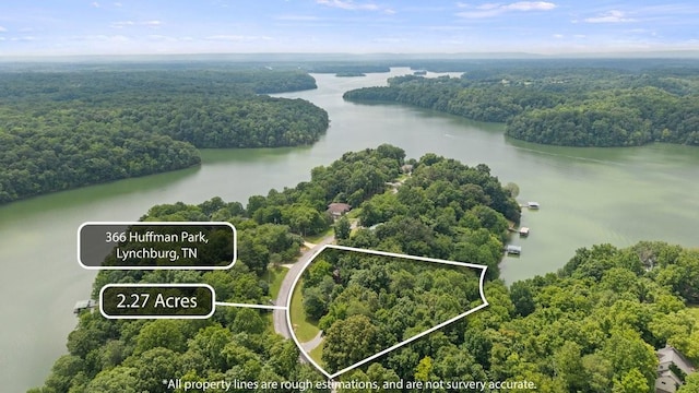 366 Huffman Park Rd, Lynchburg, TN 37352 - aerial overview of property's location with a heavily wooded area, a large body of water, and property boundaries highlighted