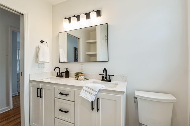 3622 Sabre Dr, Nashville, TN 37211 - bathroom featuring toilet, double vanity, and wood finished floors