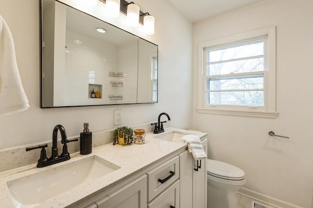 3622 Sabre Dr, Nashville, TN 37211 - full bath with double vanity, toilet, a tile shower, and baseboards