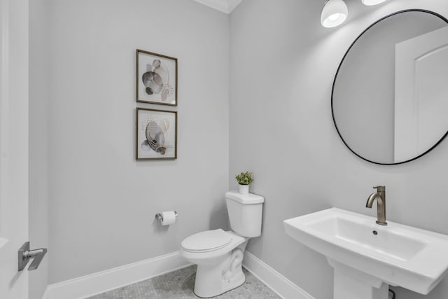 7111 Frances St, Fairview, TN 37062 - bathroom featuring baseboards, toilet, and a sink