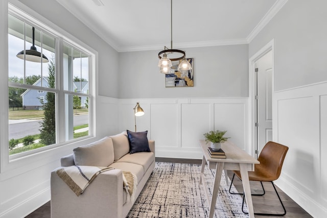 7111 Frances St, Fairview, TN 37062 - living area with a decorative wall, crown molding, wood finished floors, a wainscoted wall, and a chandelier