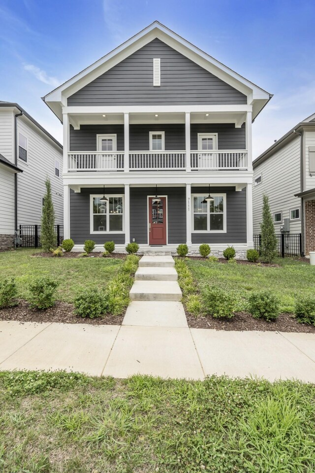 7111 Frances St, Fairview, TN 37062 - view of front of home featuring covered porch and a balcony