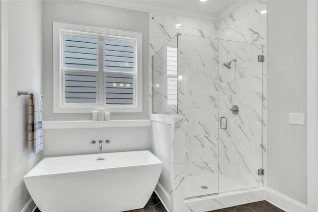 7111 Frances St, Fairview, TN 37062 - full bathroom featuring a soaking tub, baseboards, a marble finish shower, and crown molding