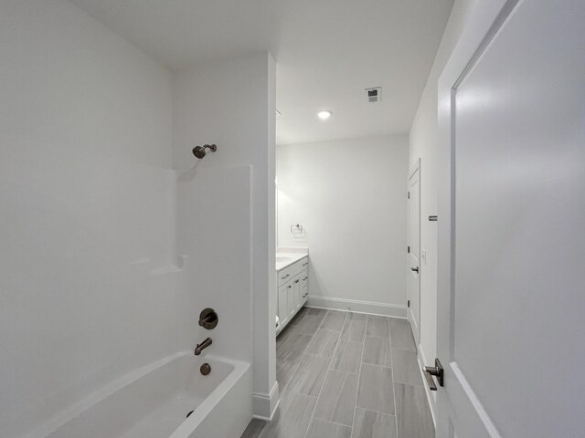 7115 Frances St, Fairview, TN 37062 - full bathroom with shower / bathtub combination, vanity, baseboards, and recessed lighting