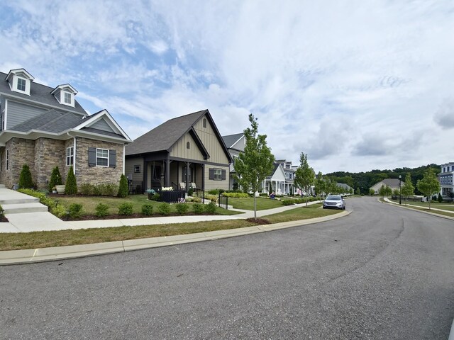 7115 Frances St, Fairview, TN 37062 - view of asphalt road featuring sidewalks, curbs, and a residential view