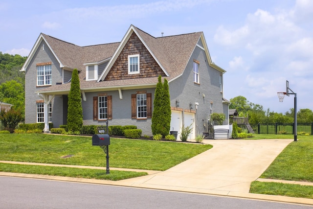 6575 Windmill Dr, College Grove, TN 37046 - view of front facade with driveway, roof with shingles, brick siding, and a garage