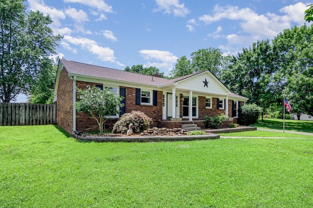 930 Rossview Rd, Clarksville, TN 37043 - ranch-style house with brick siding, covered porch, and a chimney