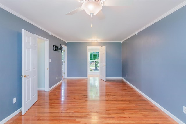 930 Rossview Rd, Clarksville, TN 37043 - unfurnished room with crown molding, ceiling fan, and light wood-style floors