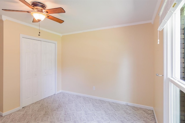 930 Rossview Rd, Clarksville, TN 37043 - unfurnished bedroom featuring ornamental molding, light colored carpet, a closet, and a ceiling fan