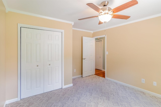 930 Rossview Rd, Clarksville, TN 37043 - unfurnished bedroom with crown molding, a closet, light carpet, and ceiling fan