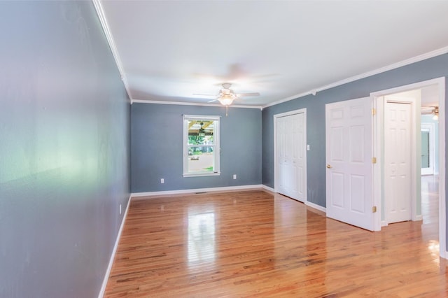 930 Rossview Rd, Clarksville, TN 37043 - unfurnished bedroom featuring ornamental molding, light wood-style flooring, and a ceiling fan