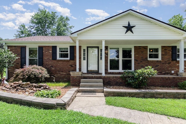 930 Rossview Rd, Clarksville, TN 37043 - view of front of home with a porch and brick siding