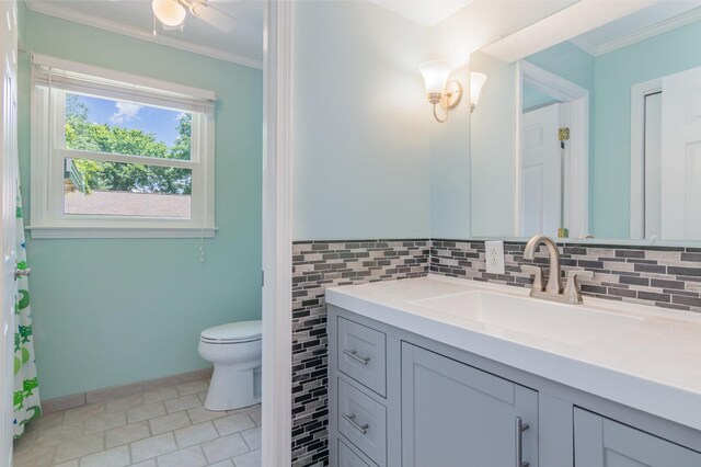 930 Rossview Rd, Clarksville, TN 37043 - bathroom featuring vanity, crown molding, tasteful backsplash, tile patterned flooring, and a ceiling fan