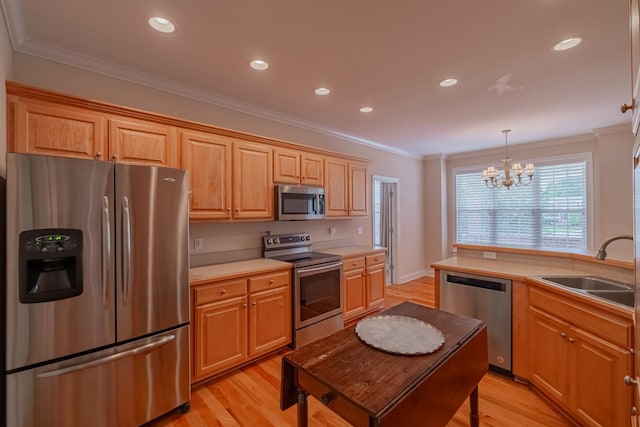 107 Hunters Ct, Tullahoma, TN 37388 - kitchen featuring stainless steel appliances, light wood-style flooring, crown molding, a chandelier, and light countertops