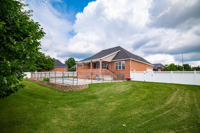 107 Hunters Ct, Tullahoma, TN 37388 - back of property with brick siding, a fenced backyard, and a patio area