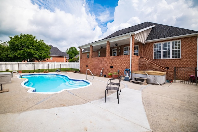 107 Hunters Ct, Tullahoma, TN 37388 - view of swimming pool featuring a hot tub, a fenced backyard, a patio area, and a ceiling fan