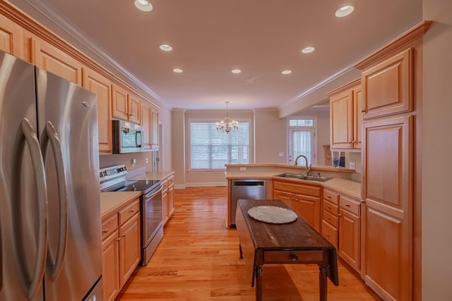 107 Hunters Ct, Tullahoma, TN 37388 - kitchen with appliances with stainless steel finishes, crown molding, a chandelier, light wood-style flooring, and recessed lighting