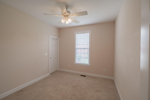 107 Hunters Ct, Tullahoma, TN 37388 - empty room with light colored carpet and a ceiling fan