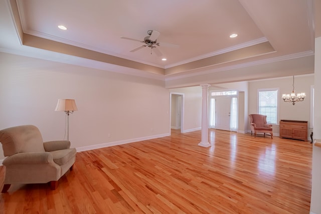 107 Hunters Ct, Tullahoma, TN 37388 - unfurnished room with a raised ceiling, crown molding, light wood-style flooring, ceiling fan, and recessed lighting