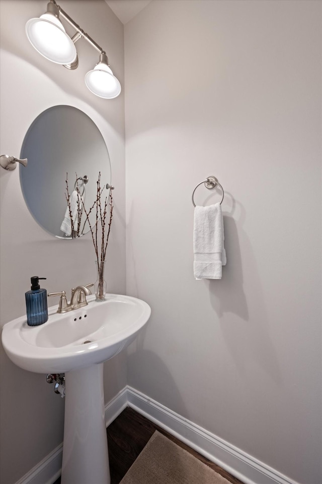 3204 Vinemont Dr, Thompsons Station, TN 37179 - bathroom with wood finished floors, baseboards, and a sink