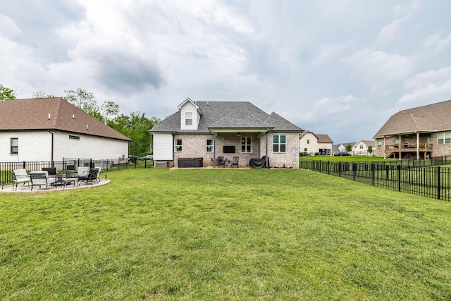 403 Hunter Bryce Ln, Lebanon, TN 37087 - back of house featuring a patio area, a fire pit, brick siding, and roof with shingles