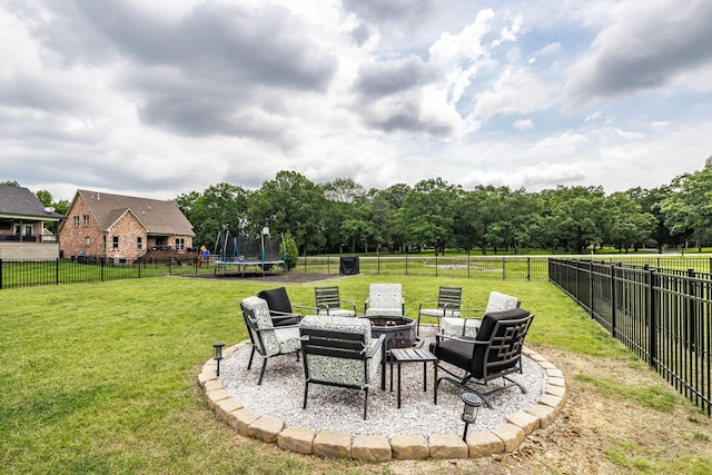 403 Hunter Bryce Ln, Lebanon, TN 37087 - view of yard with a trampoline and an outdoor fire pit
