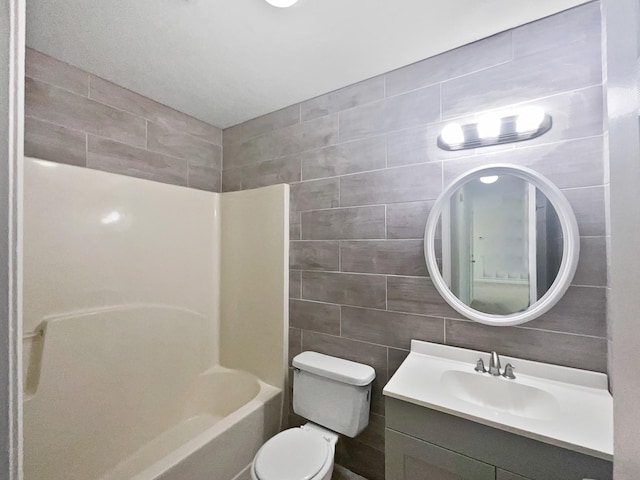 108 Nancy Ave, Pleasant View, TN 37146 - bathroom featuring tile walls, toilet, vanity, and tub / shower combination
